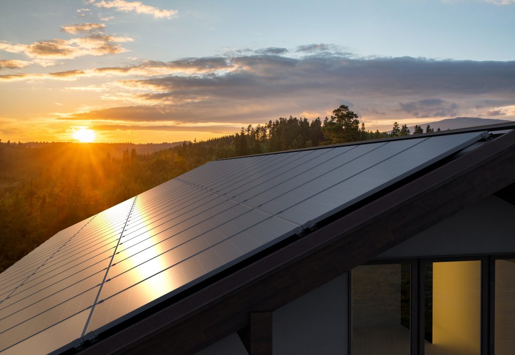 Solar Panels at sunset on roof of residential property