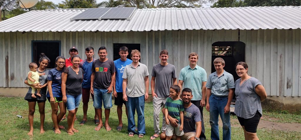 Solar Systems for Missions missionaries and townspeople outdoors
